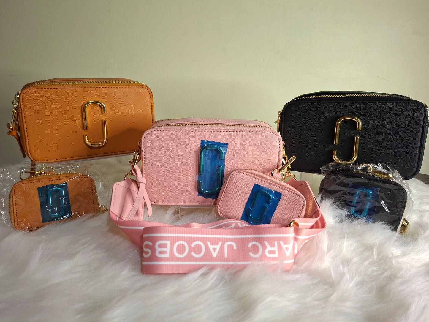 Marc Jacobs ,cross body bag with coin purse Whatsapp 476-1357 to order.