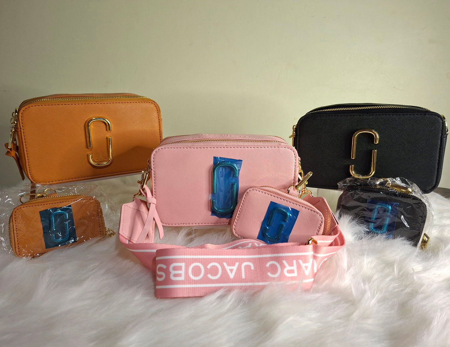 Marc Jacobs ,cross body bag with coin purse Whatsapp 476-1357 to order.