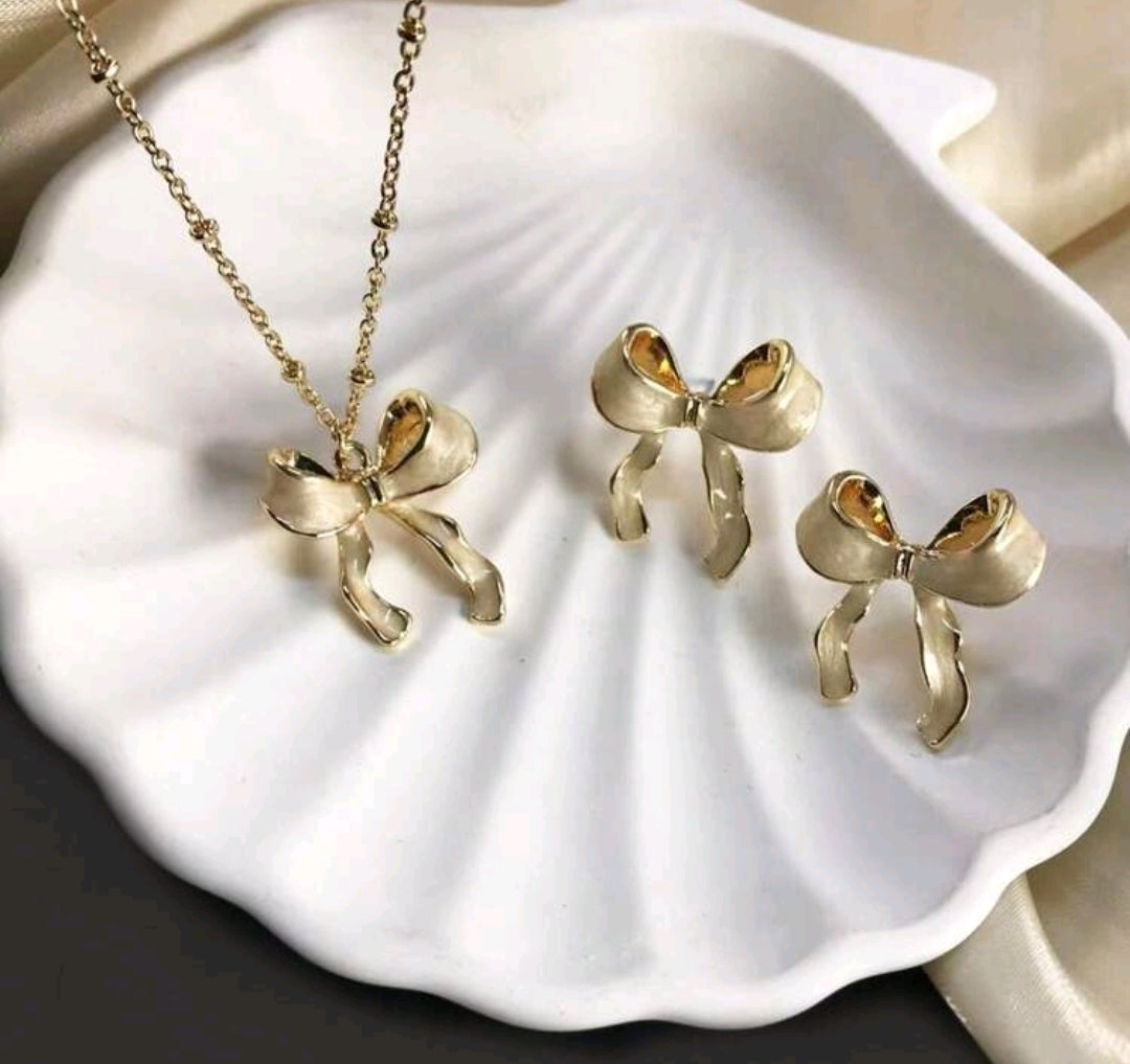 2 pc Enamel bowknot necklace and earrings.