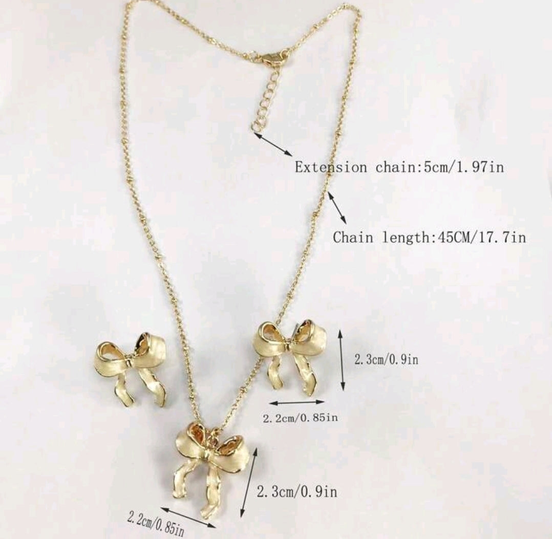 2 pc Enamel bowknot necklace and earrings.