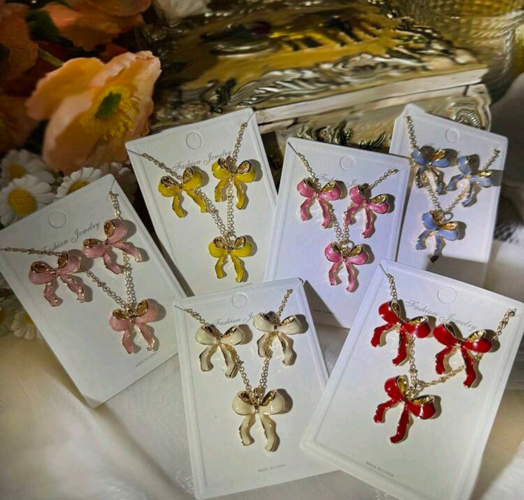 2 pc Enamel bowknot necklace and earrings.