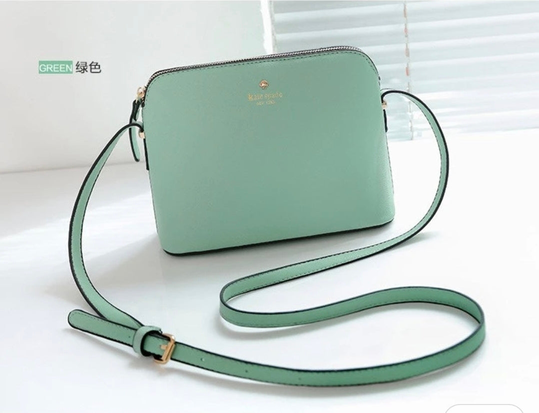 Kate spade cross body purse:-   Whatsapp 476-1357 to order.