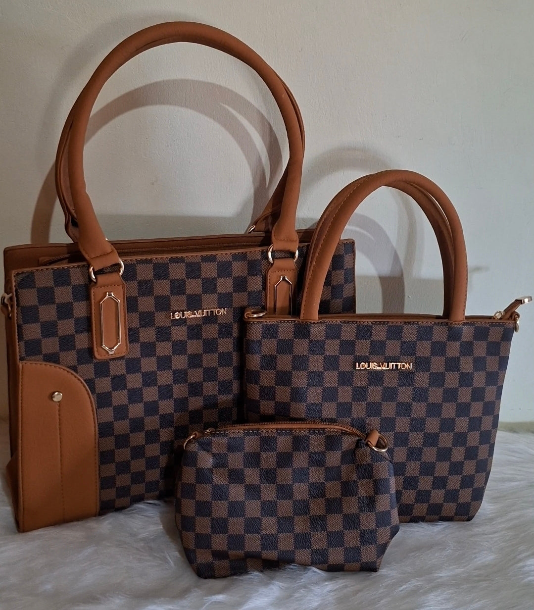 Louis Vuitton, 3 piece hand bags. Whatsapp 476-1357 to order.