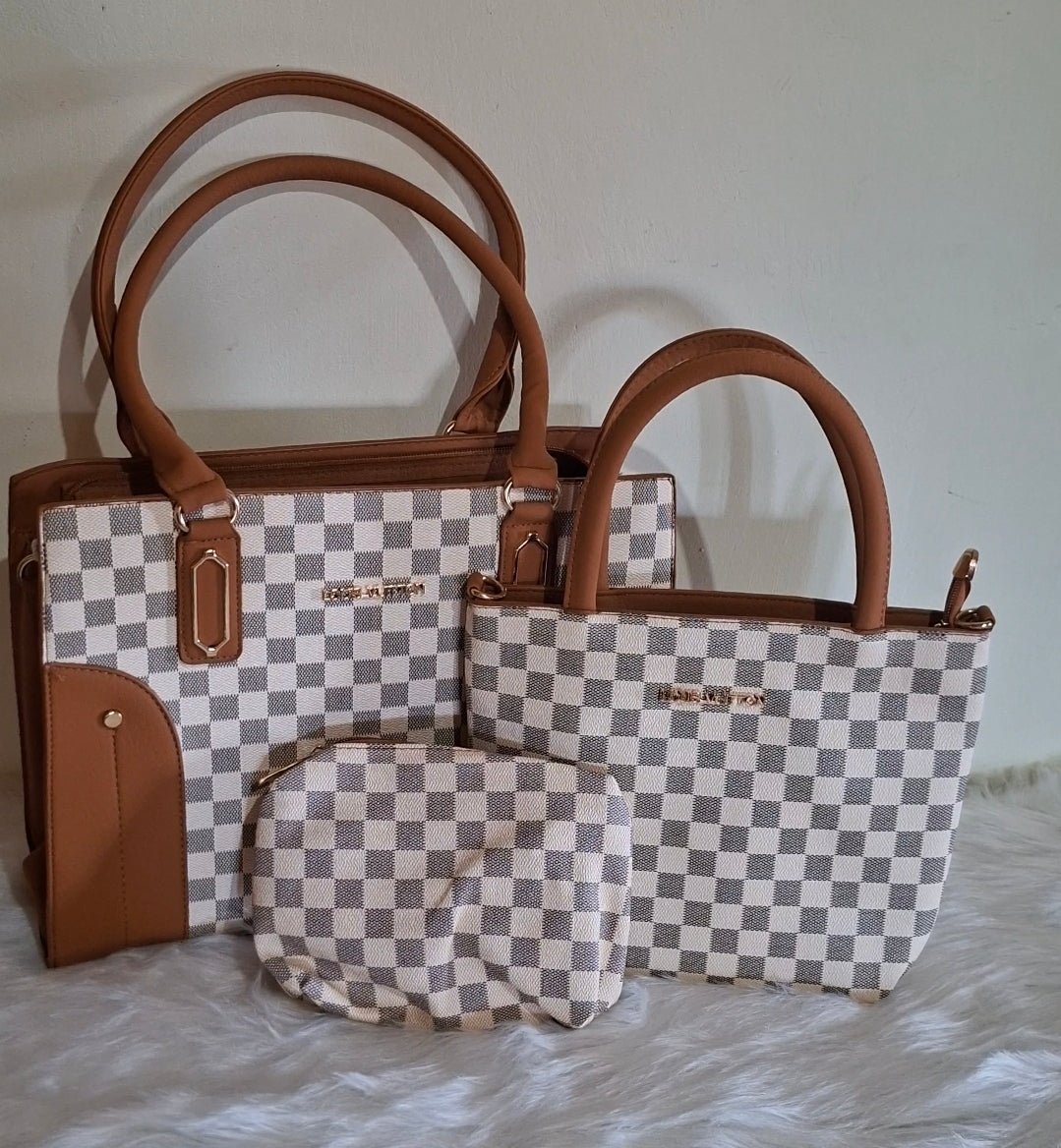 Louis Vuitton, 3 piece hand bags. Whatsapp 476-1357 to order.