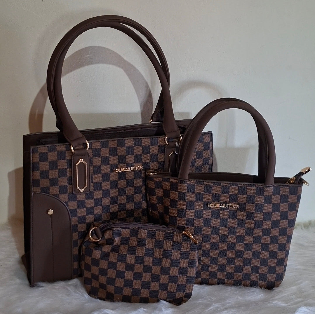 Louis Vuitton, 3 piece hand bags. Whatsapp 476-1357 to order.