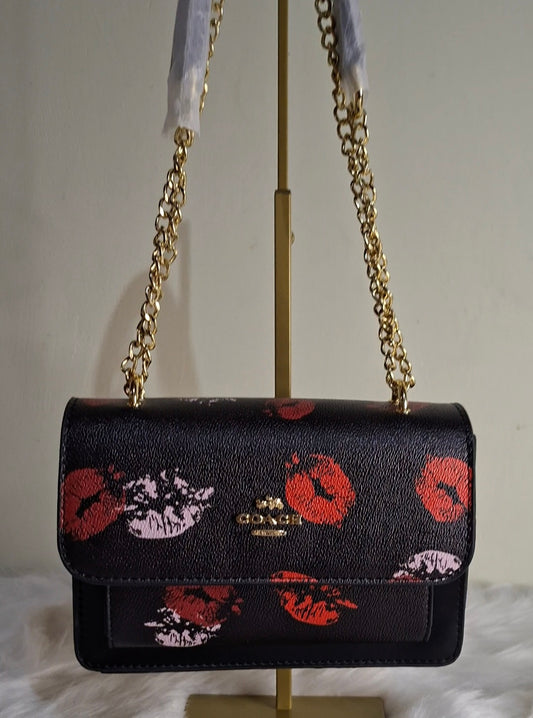 Lip print Coach cross body bag,whatsapp 476-1357 to order.